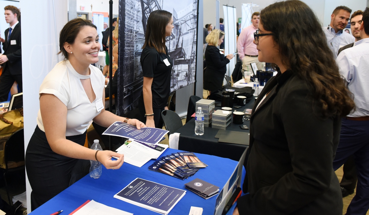 Female students at a career fair